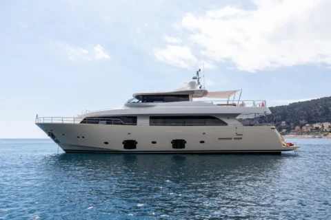 Luxury motor yacht Ferretti Custom Line Navetta 26 'La Pausa' moored off the coast, elegant and spacious design, perfect for high-end sailing experiences.
